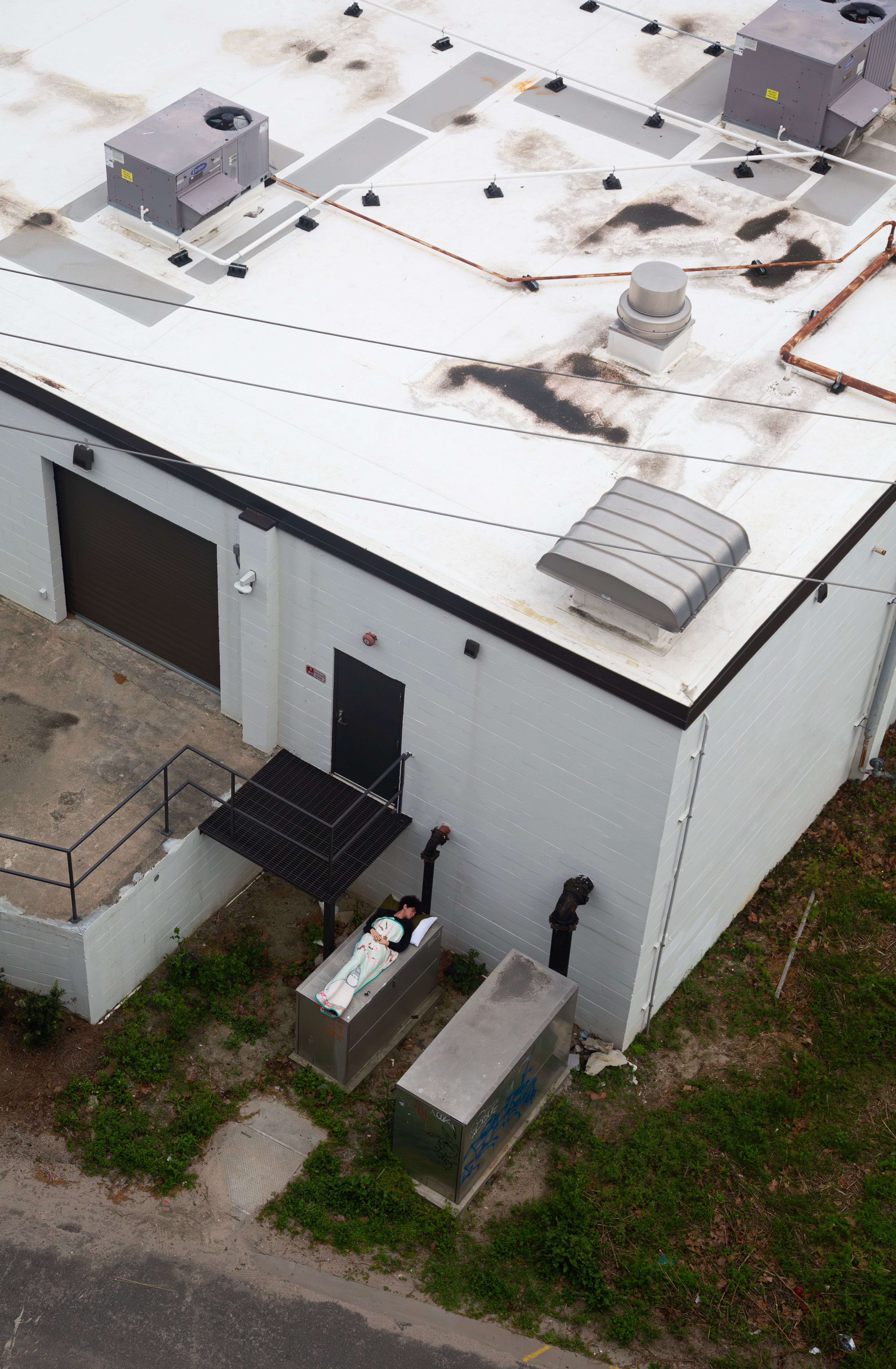 Aerial view of an industrial rooftop with mechanical equipment